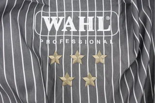 27894_B2B_en-eu_pictures_product_512991_wahl-barber-cutting-cape_1920x1080_1.jpg.webp